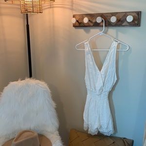 White lace open back romper.